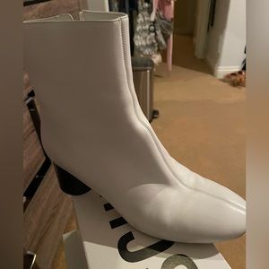 Vince white booties. Great condition. Worn a couple of times. Size 9.